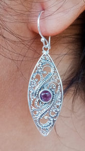 NYER059AM Bali Eye Shape Earrings in Silver with Amethyst gemstones.